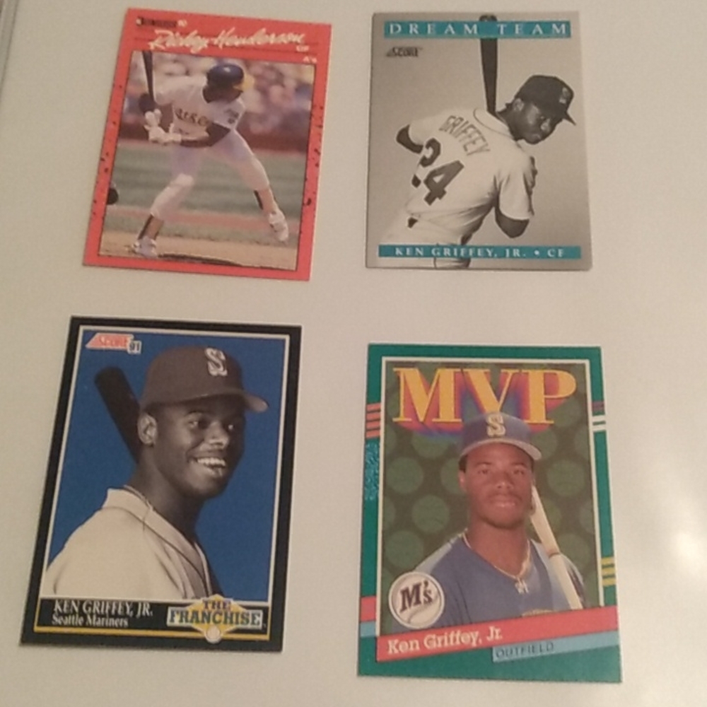 3 ken Griffey Jr one Rickey Henderson all authentic and mint condition